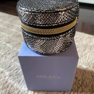 Mele & Co. Round Jewelry Case - Black & White Snake Print with Gold Zipper
